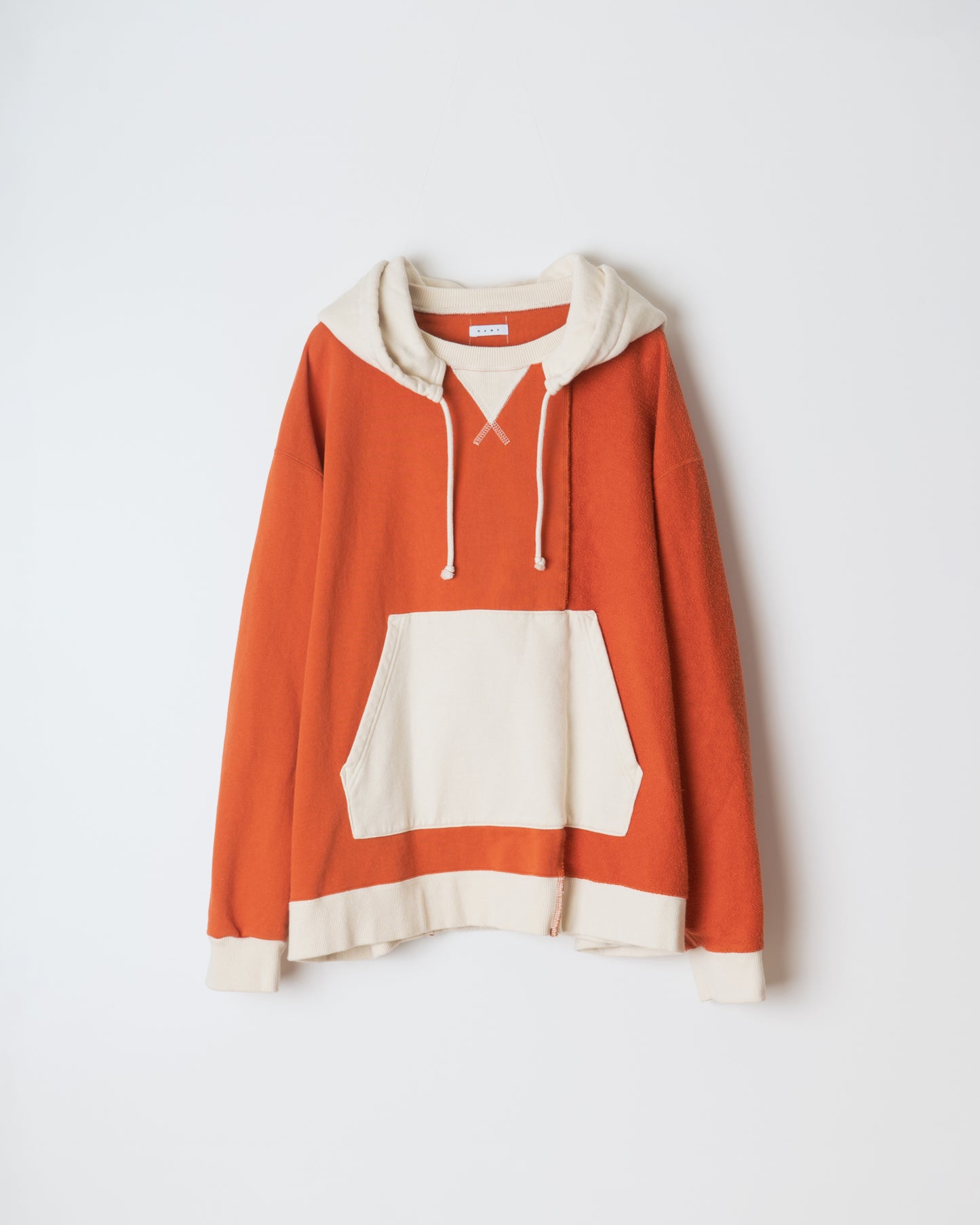 ASYMMETRIC SWITCHING HOODIE