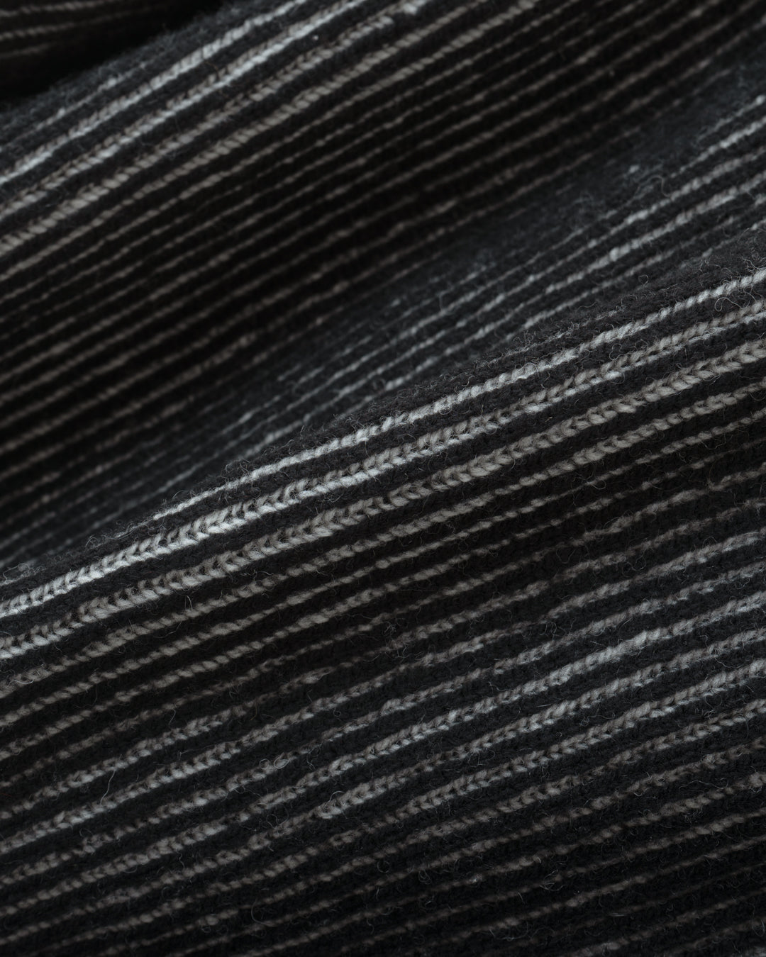 REVERSIBLE WOOL DRIVERS KNIT