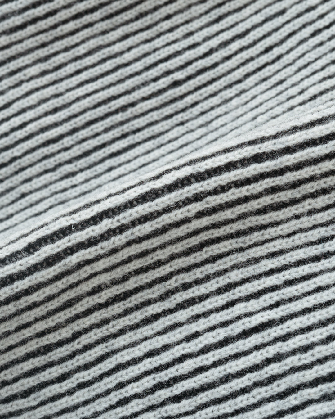 REVERSIBLE WOOL DRIVERS KNIT