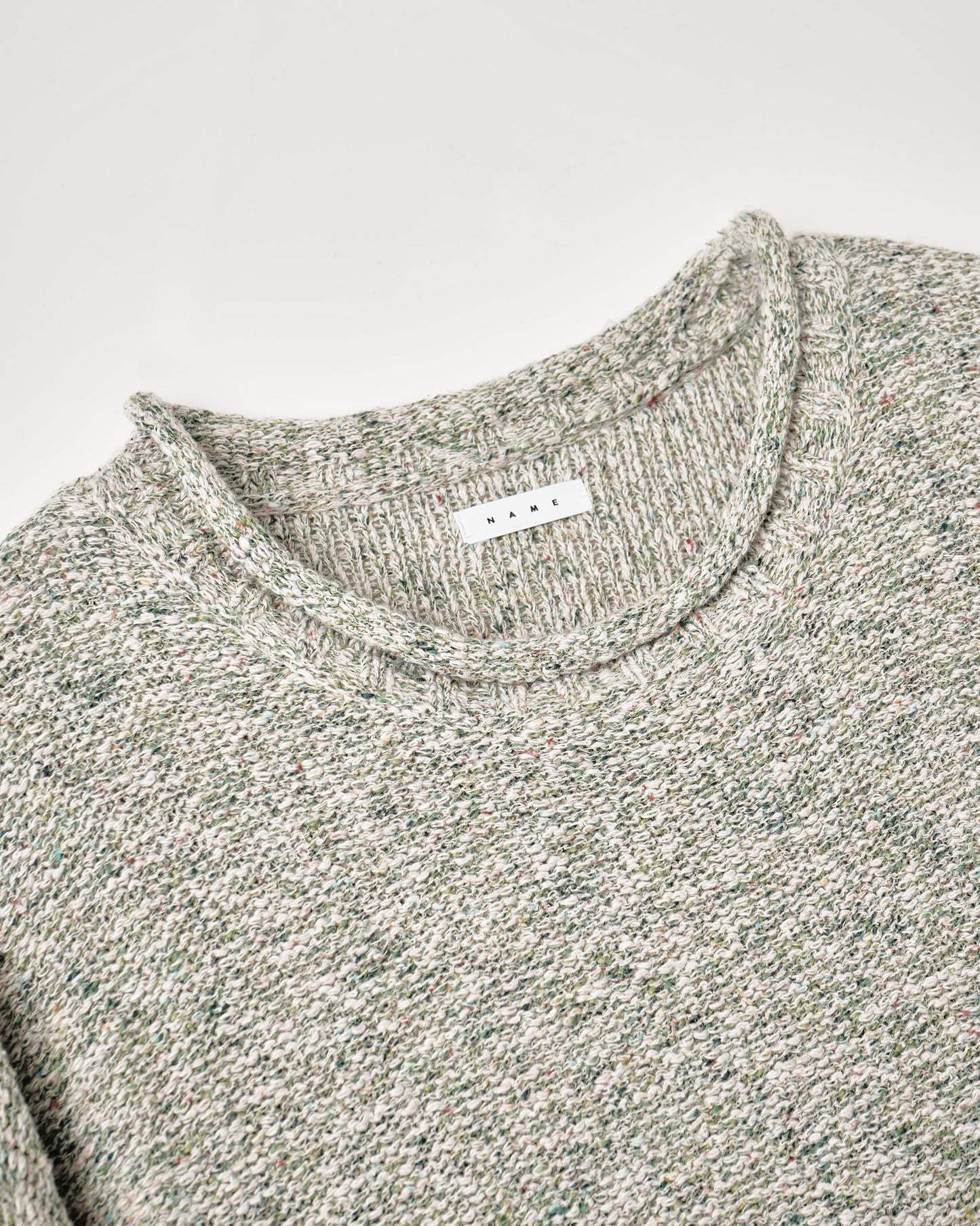 SHIFTED MELANGE KNIT PULLOVER : INSIDE OUT