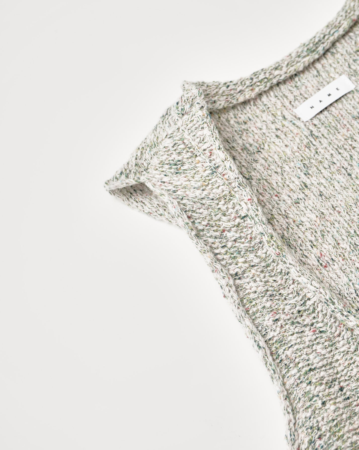 SHIFTED MELANGE KNIT VEST : INSIDE OUT