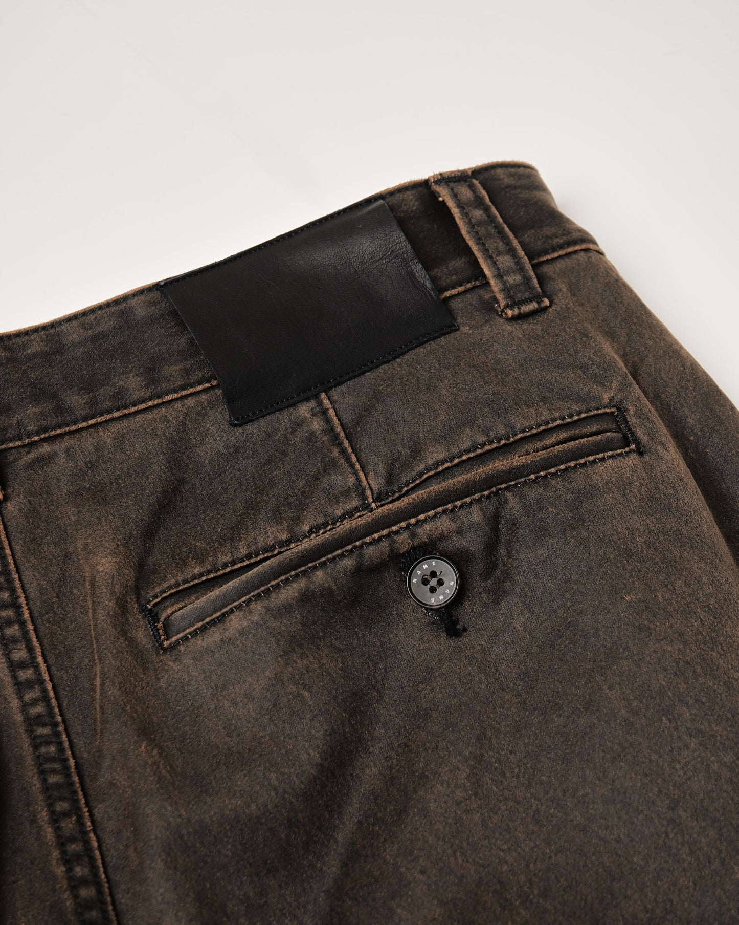 WAX COATING STRAIGHT TROUSERS : DELTA SHAPE